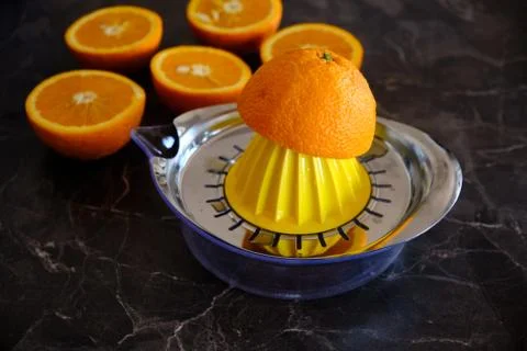 Orange Juice, Vitamin C Boost, Freshly hand juiced fruit juice. Half cut oran Stock Photos
