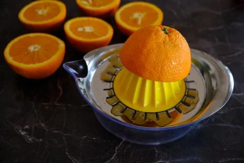 Orange Juice, Vitamin C Boost, Freshly hand juiced fruit juice. Half cut oran Stock Photos