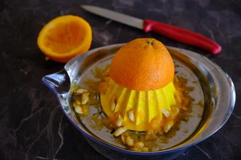 Orange Juice, Vitamin C Boost, Freshly hand juiced fruit juice. Half cut oran Stock Photos
