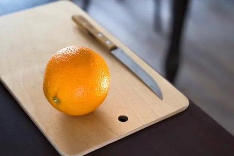 Orange on a kitchen table Stock Photos