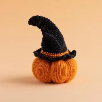 Orange knitted pumpkin Stock Photos