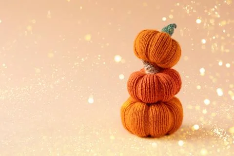 Orange knitted pumpkins Stock Photos