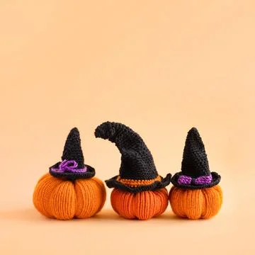 Orange knitted pumpkins Stock Photos