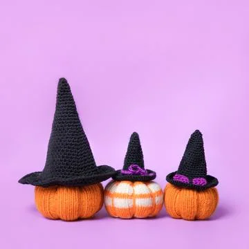 Orange knitted pumpkins Stock Photos