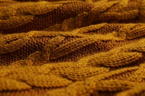 Orange knitted wool texture as background, closeup Stock Photos