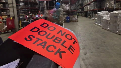 Orange Label Indicated Do Not Double Stack in Cargo Warehouse Stock Footage 258060399
