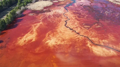 Orange lake. Ecological catastrophy. Stock Footage 129851170