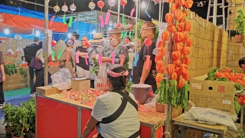 Orange Lantern Flower Strings and Wind Chimes at Temple Festival Stall, Tokyo Video stock 342712166