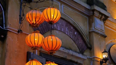 Orange lanterns in old quarter of Hoi An, Vietnam in 4k Stock Footage 84836681