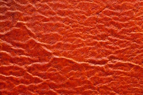 Orange leather background Stock Photos