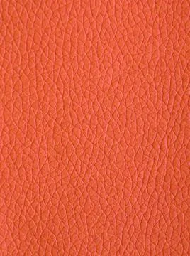 Orange leather close up texture for background Stock Photos