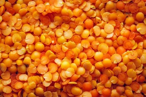 Orange lentils macro background Stock Photos