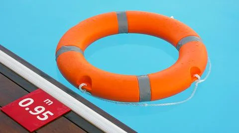 Orange  lifebuoy pool ring float Foto stock
