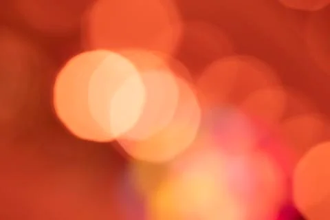 Orange light bokeh background- abstract texture with highlights Stock-Fotos