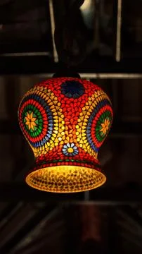 Orange light hanging by a thread Stock Photos