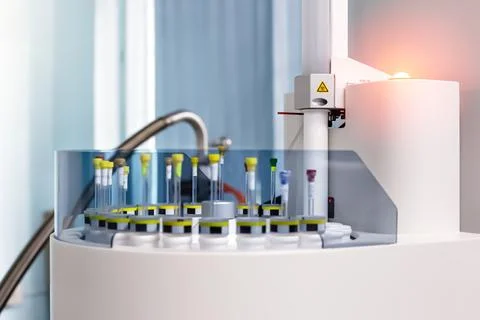 Orange light indicates the loading status of a sample with NMR spectroscopy.. Stock Photos