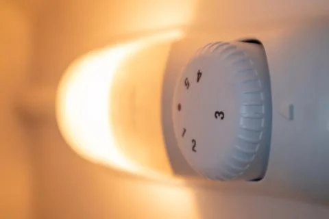 Orange light inside the refrigerator close-up. A lamp that turns on when the  Stock Photos