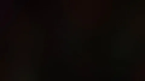 An orange light leak flashing glowing effect. Vídeo Stock 107483650