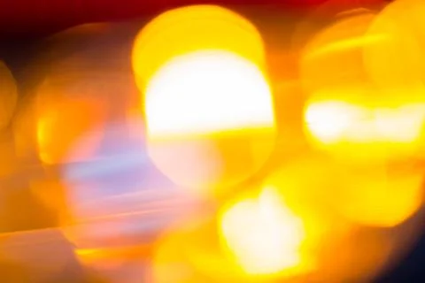 Orange light pattern from car turning indicator light Stock Photos