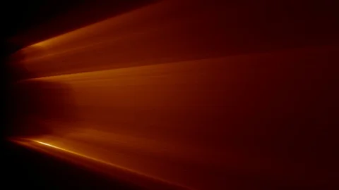 Orange light rays in motion Stock Footage 85970279