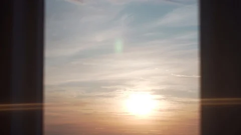Orange light of the setting sun in the window Stock Footage 121313315