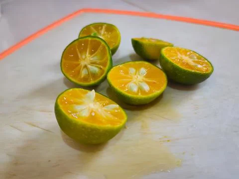 Orange lime in the plate Stock Photos