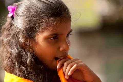 Orange little girl Stock Photos