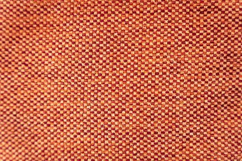 Orange mini squares fabric texture bg Stock Photos