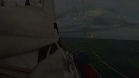 Orange Moon over the Horizon, Sailing Gulf of Mexico Stock Footage 183108380