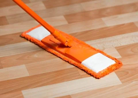 Orange MOP on the floor. Close up Stock-Fotos