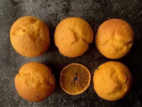 Orange muffins on a black background Foto stock
