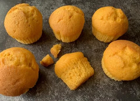 Orange muffins on a black background Foto stock