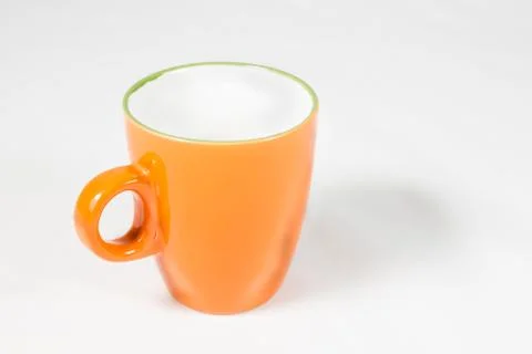 Orange mug Stock Photos