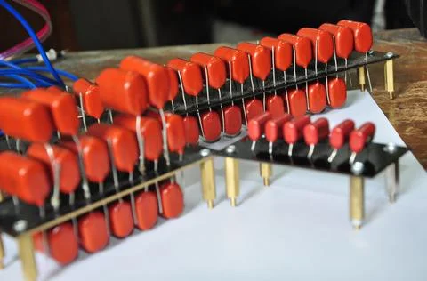 Orange mylar capacitors connected in parallel Stock Photos