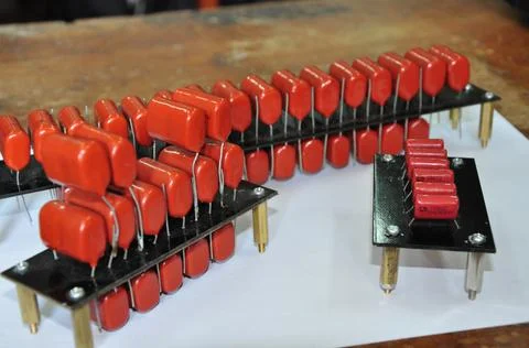 Orange mylar capacitors connected in parallel Stock Photos
