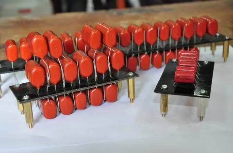 Orange mylar capacitors connected in parallel Stock Photos