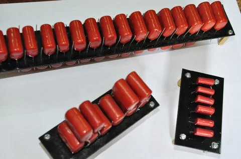 Orange mylar capacitors connected in parallel Stock Photos