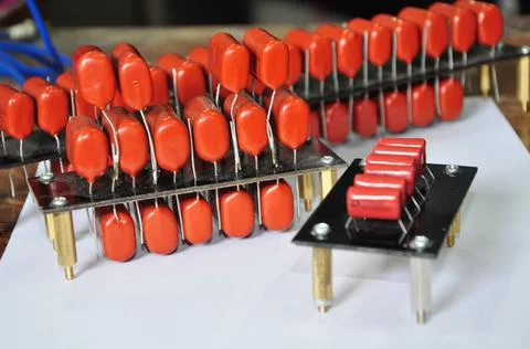 Orange mylar capacitors connected in parallel Stock Photos
