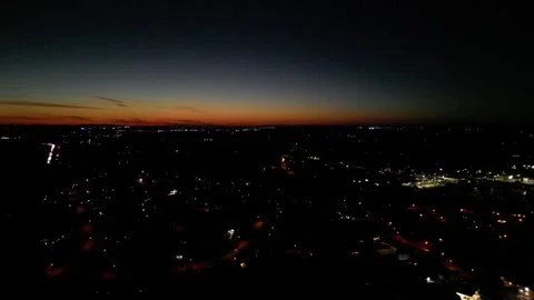 Orange Night Sky Drone Orbit in with Highway Below Drone Stock Footage 292671892