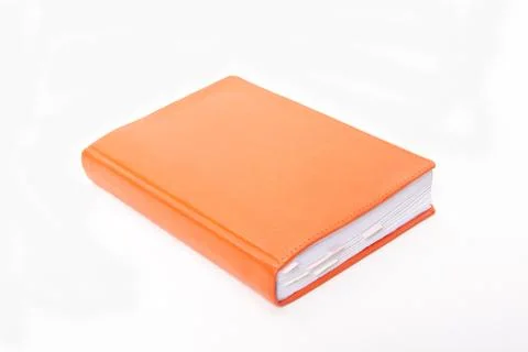 Orange notepad with bookmarks on white background Stock Photos