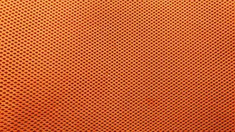 Orange nylon fabric pattern texture background. Stock Photos