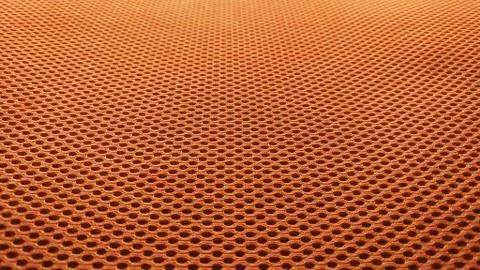 Orange nylon fabric pattern texture background. Stock Photos
