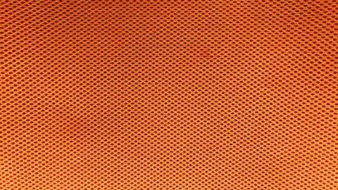 Orange nylon fabric pattern texture background. Stock Photos