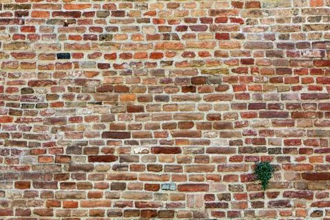 Orange old brick wall Stock Photos