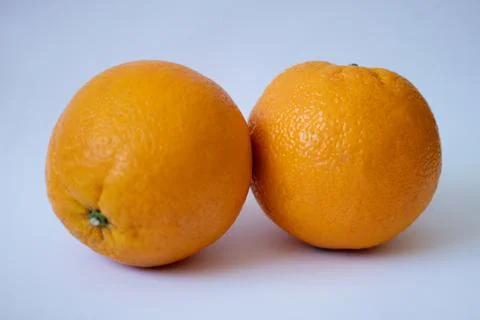 Orange oranges on a white isolated background Stock Photos