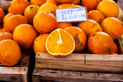 Orange with others inside box Stock Photos