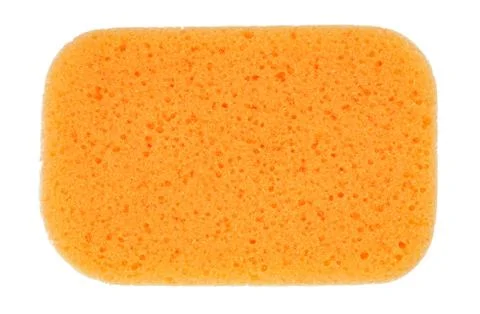 Orange oval bath sponge isolated on white Fotos Stock