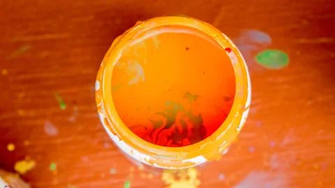 Orange Paint bottle Stock Photos