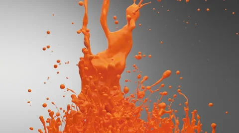 Orange paint bouncing and making splash. Slow Motion. Stock Footage 51805749