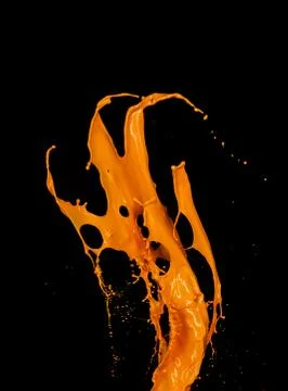 Orange paint splash on black background Stock Illustration